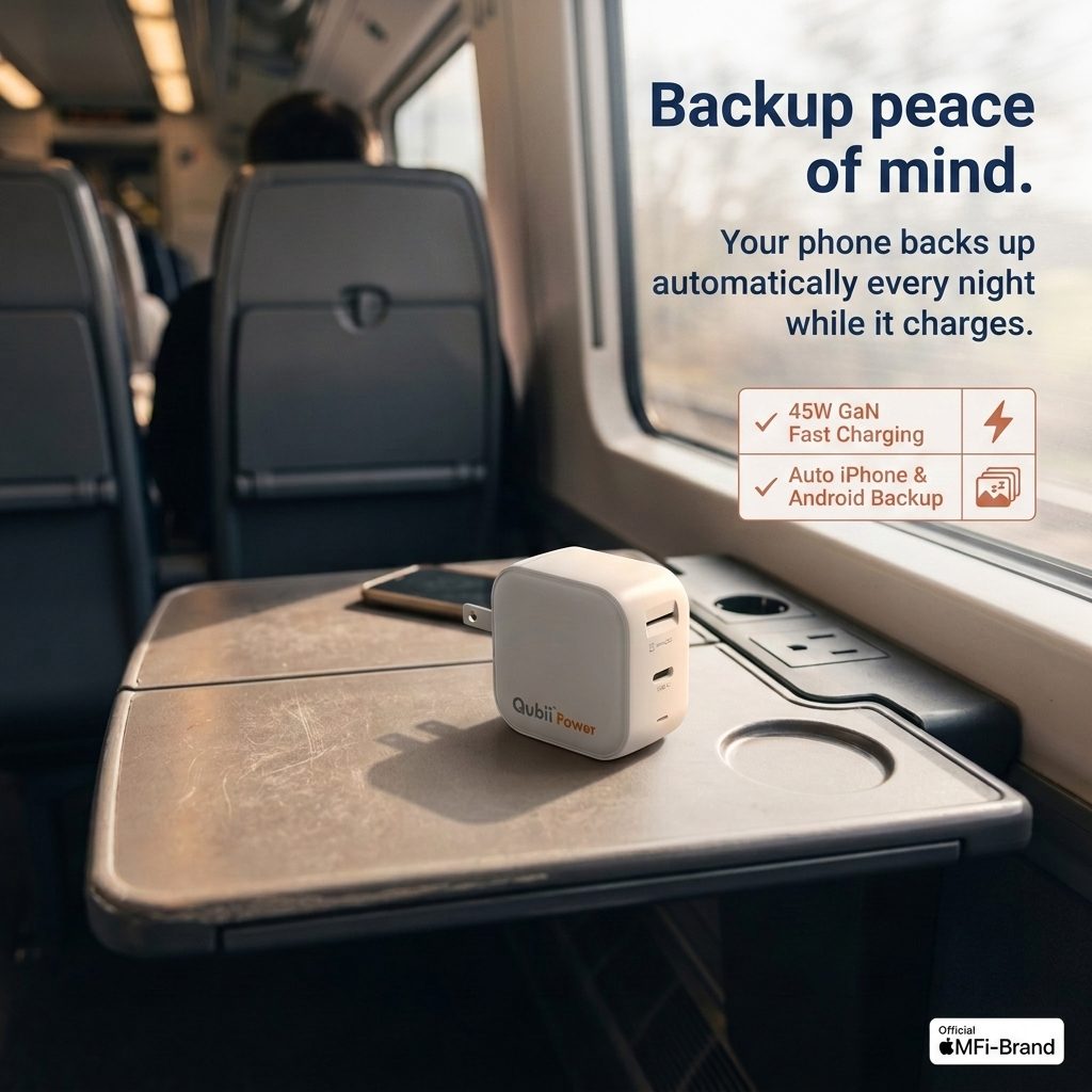 Qubii Power on a train tray — backup peace of mind on the move